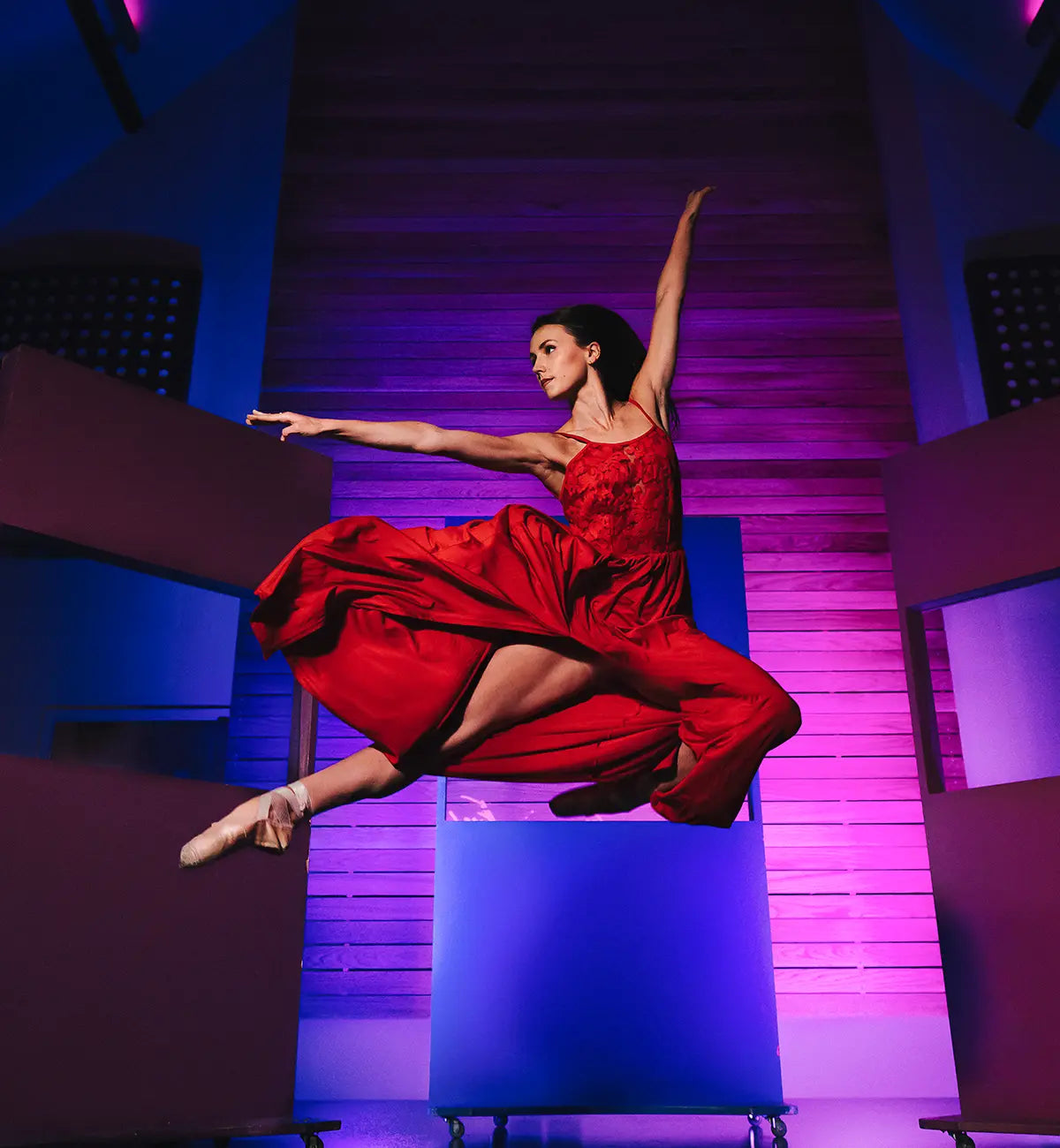 Ballet dancer jumping mid air, lit with a neo 3 pro